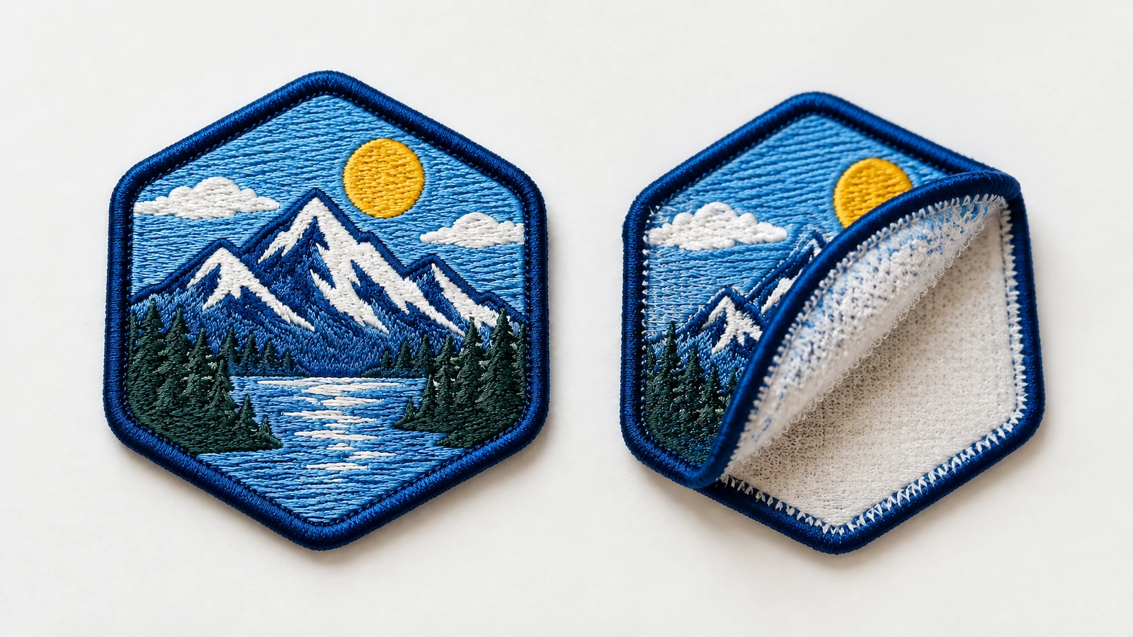 刺繍ワッペンの表と裏 青い山のワッペンの表側。その隣では、もう枚のワッペンが裏面を見せるように折られている
